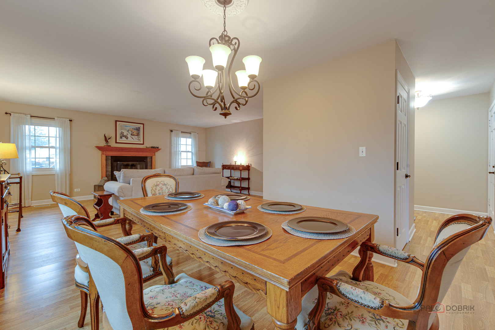 441 Arbor Gate Lane Buffalo Grove, IL 60089 - Photo 10 of 29 a view of a dining room with furniture wooden floor and chandelier