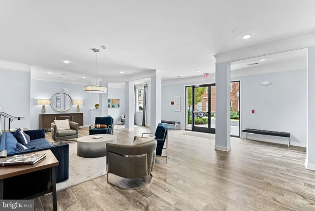 a bathroom with a sink a mirror and a shower