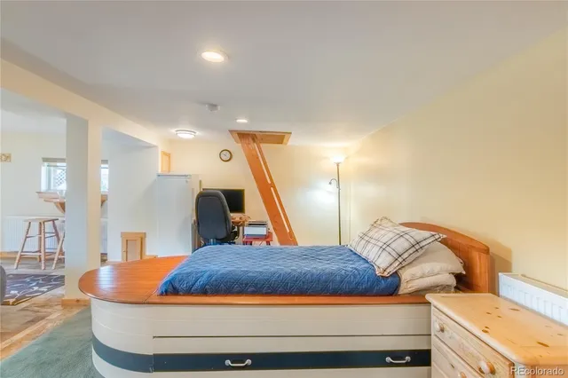 a room with a bed and bathroom