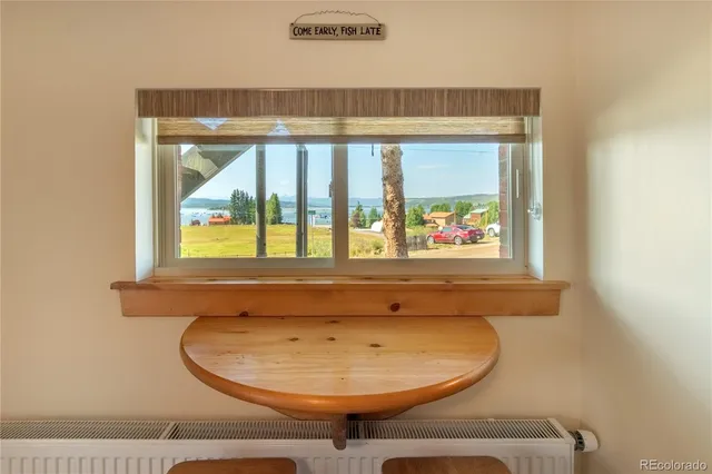 a bathroom with a sink and a window
