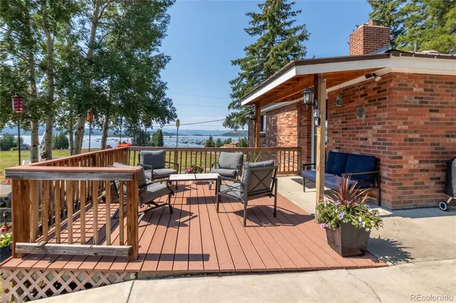 a view of house with outdoor seating space