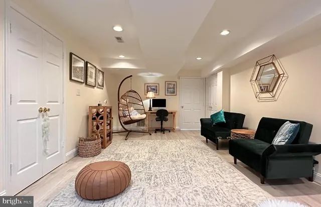 a living room with furniture and a table