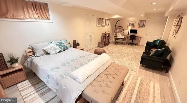 a bed room with a bed and a couch