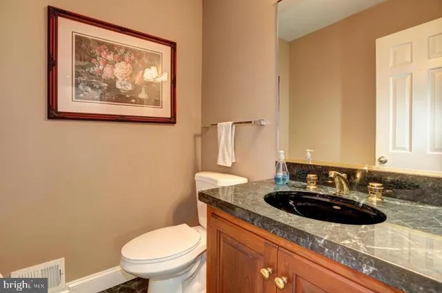 a bathroom with a sink and a toilet