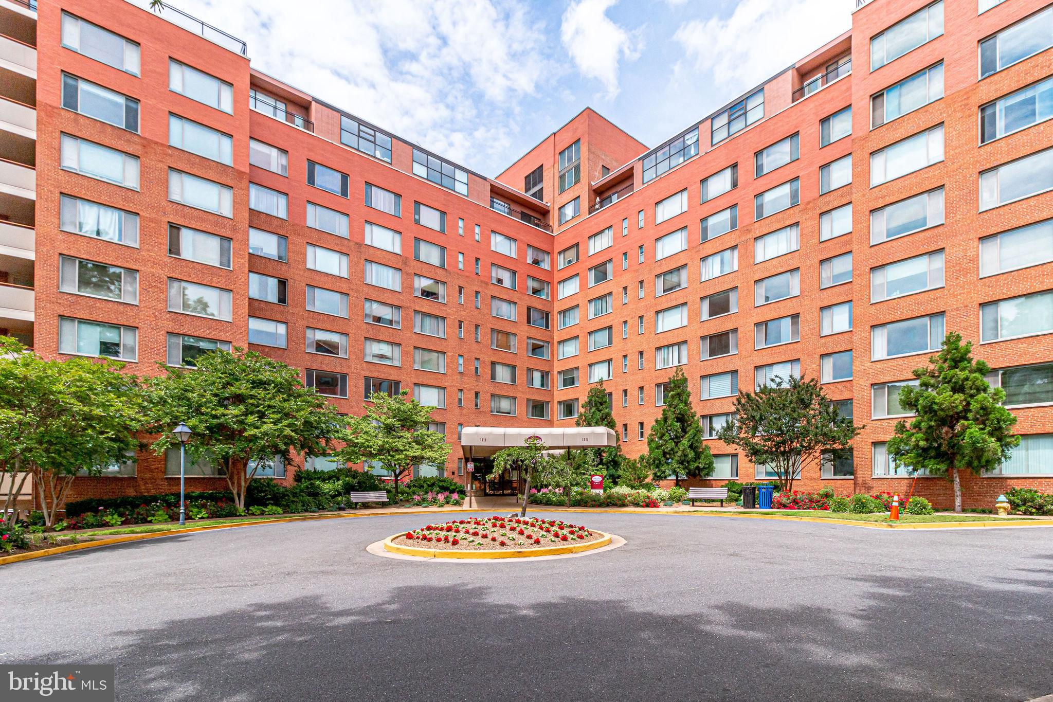 1111 Arlington Boulevard, Unit 812 Arlington, VA 22209 - Photo 1 of 37 a building view with a outdoor space