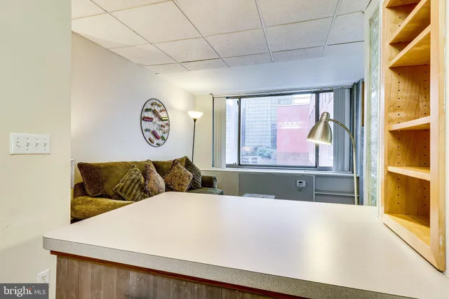 a living room with furniture and window