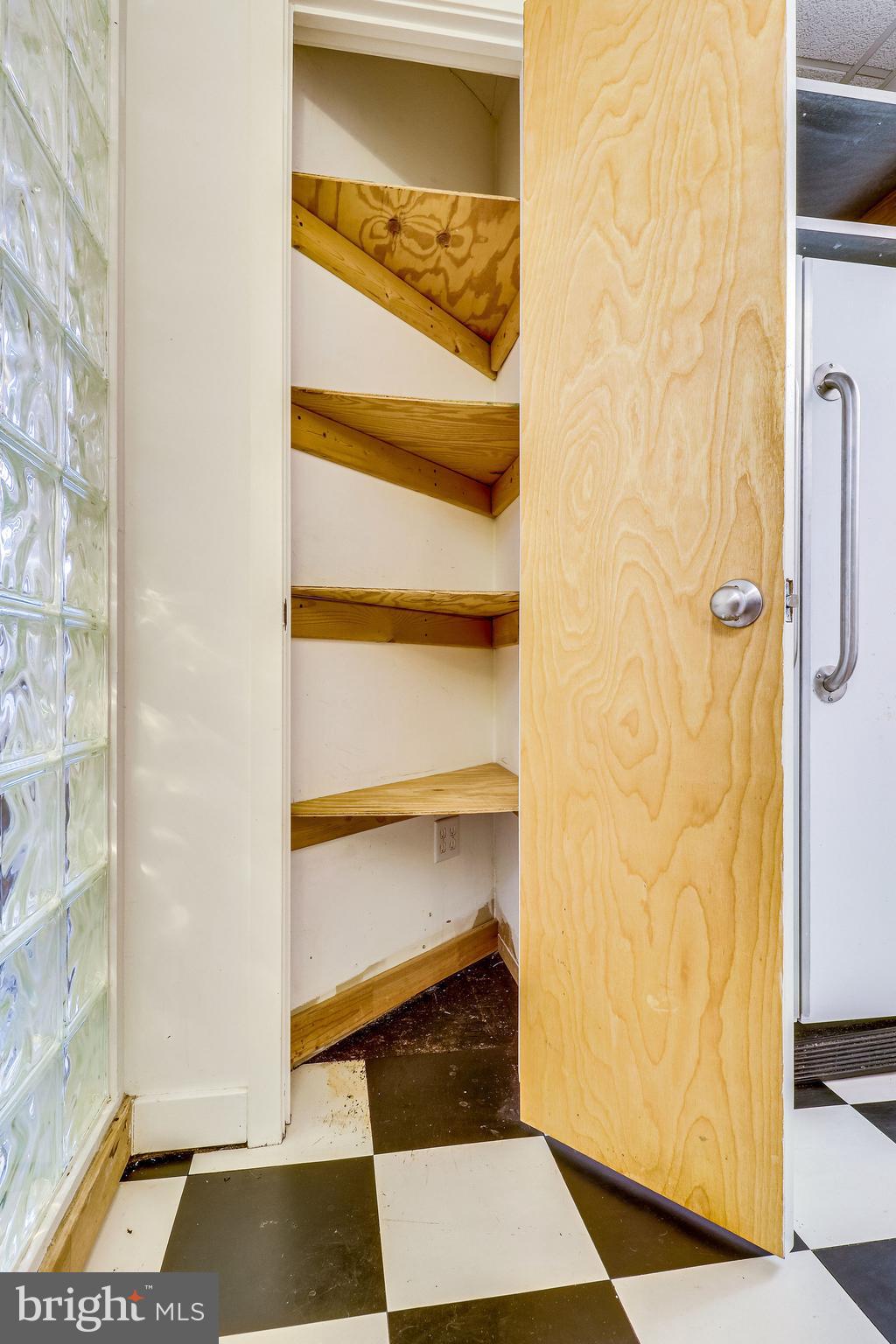 1111 Arlington Boulevard, Unit 812 Arlington, VA 22209 - Photo 21 of 37 a view of walk in closet with empty racks