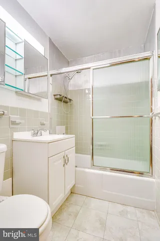 a view of a room with furniture and wooden floor