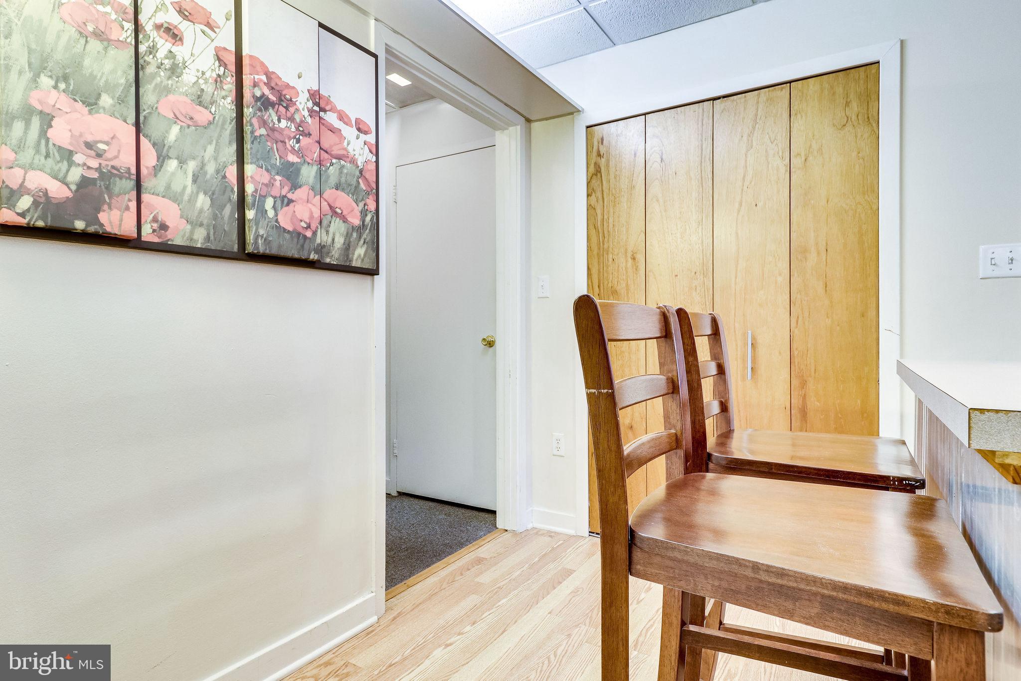 1111 Arlington Boulevard, Unit 812 Arlington, VA 22209 - Photo 33 of 37 a view of a room with furniture and wooden floor