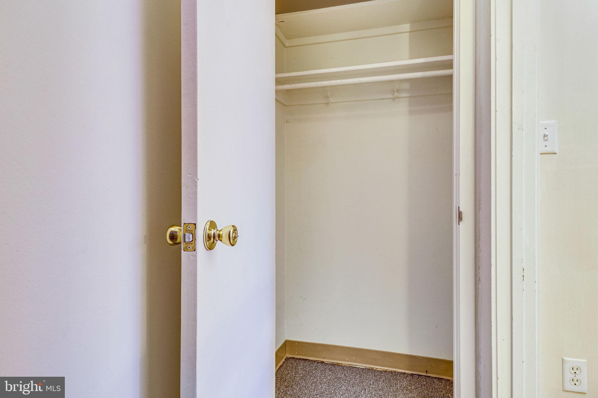 1111 Arlington Boulevard, Unit 812 Arlington, VA 22209 - Photo 35 of 37 a bathroom with a glass shower door