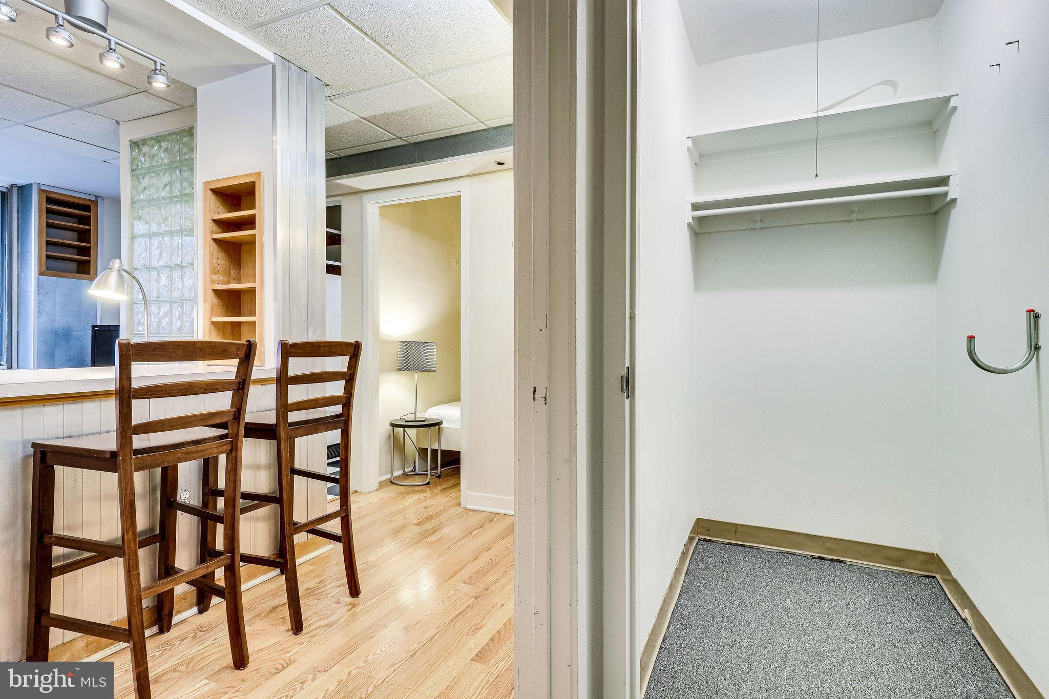 1111 Arlington Boulevard, Unit 812 Arlington, VA 22209 - Photo 8 of 37 a view of a livingroom with furniture and hardwood floor