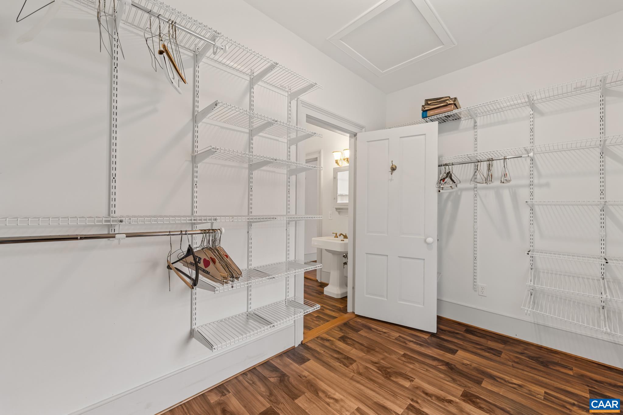 9451 Black Walnut Run Road Rhoadesville, VA 22542 - Photo 39 of 72 a view of a room with rack on the wall and a shower