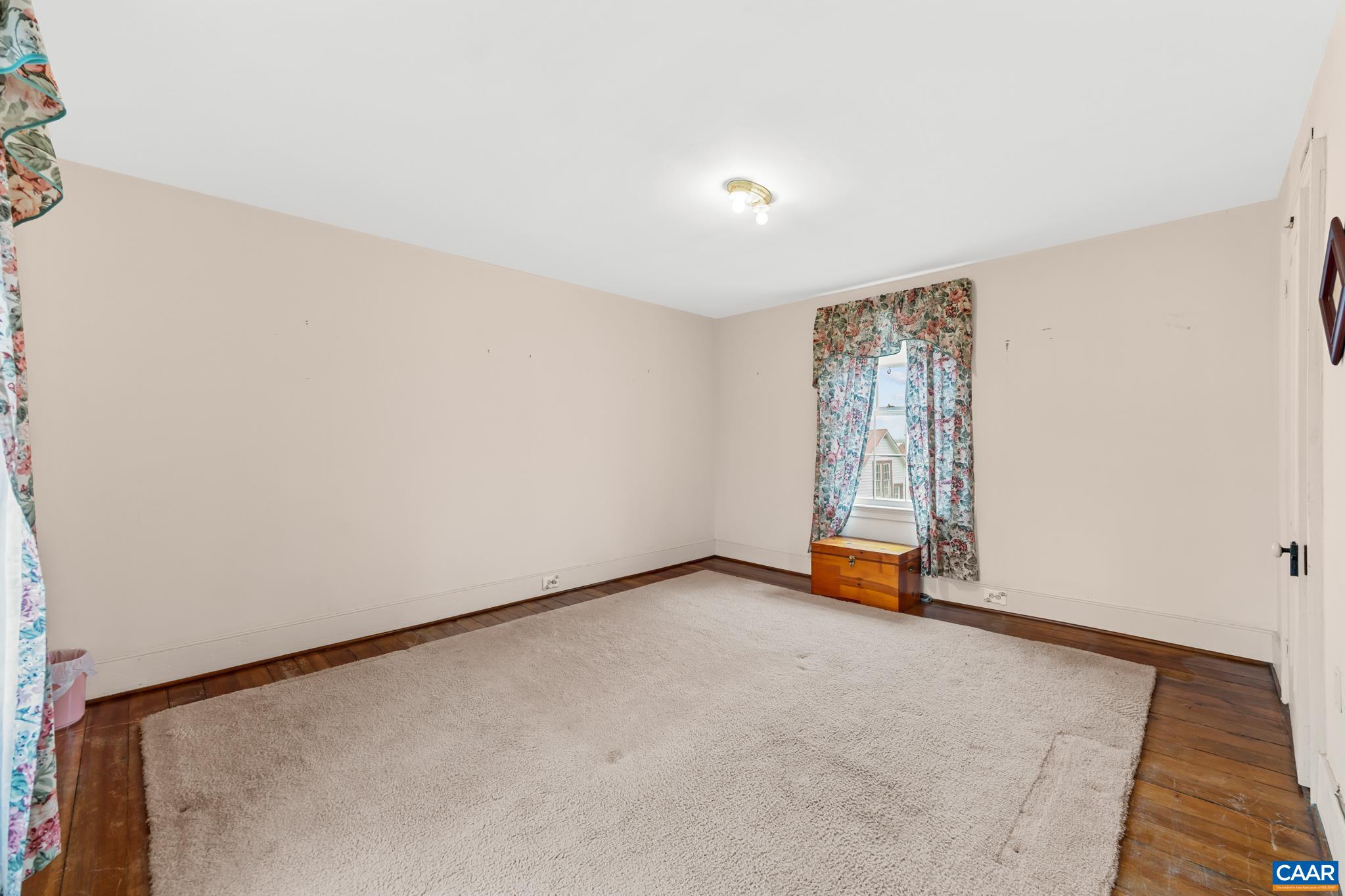9451 Black Walnut Run Road Rhoadesville, VA 22542 - Photo 42 of 72 an empty room with window