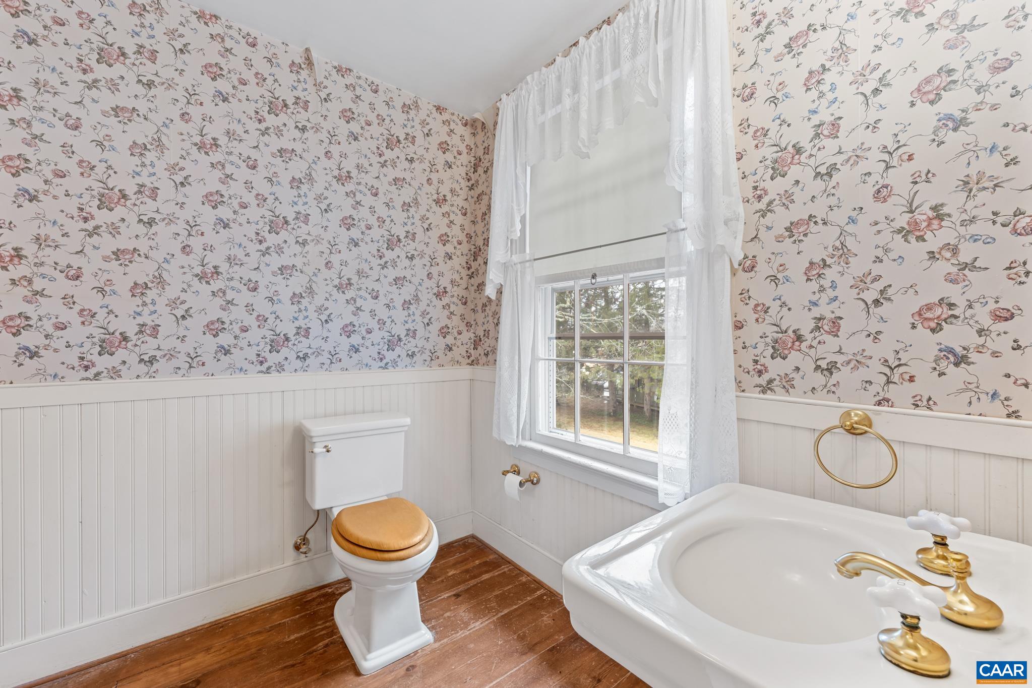 9451 Black Walnut Run Road Rhoadesville, VA 22542 - Photo 46 of 72 a bathroom with a toilet and a sink