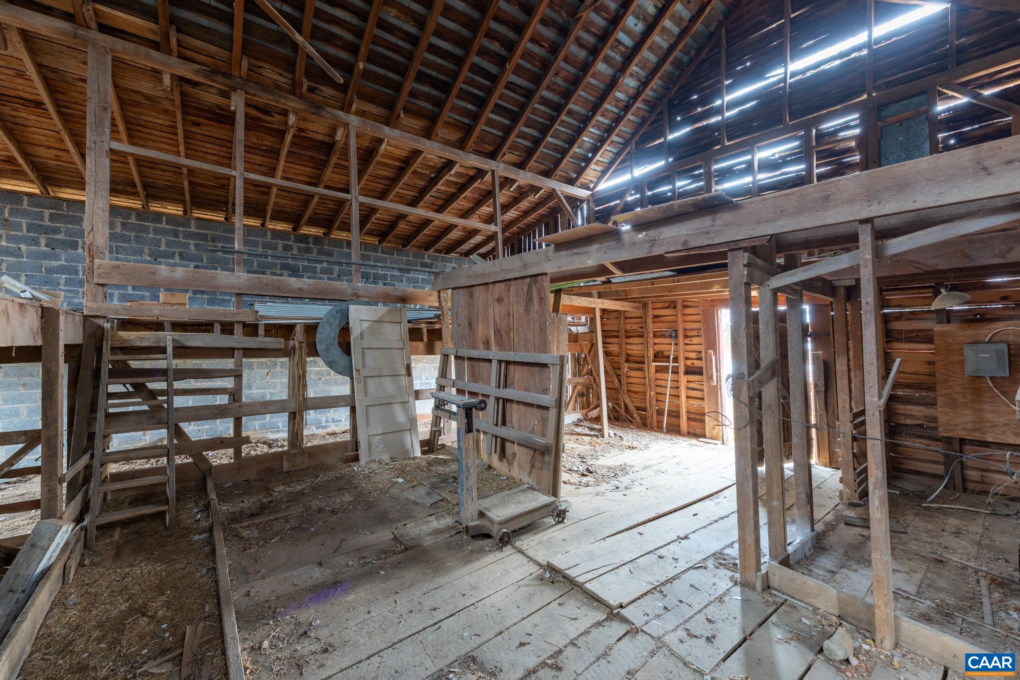 9451 Black Walnut Run Road Rhoadesville, VA 22542 - Photo 64 of 72 a view of an empty room with wooden roof
