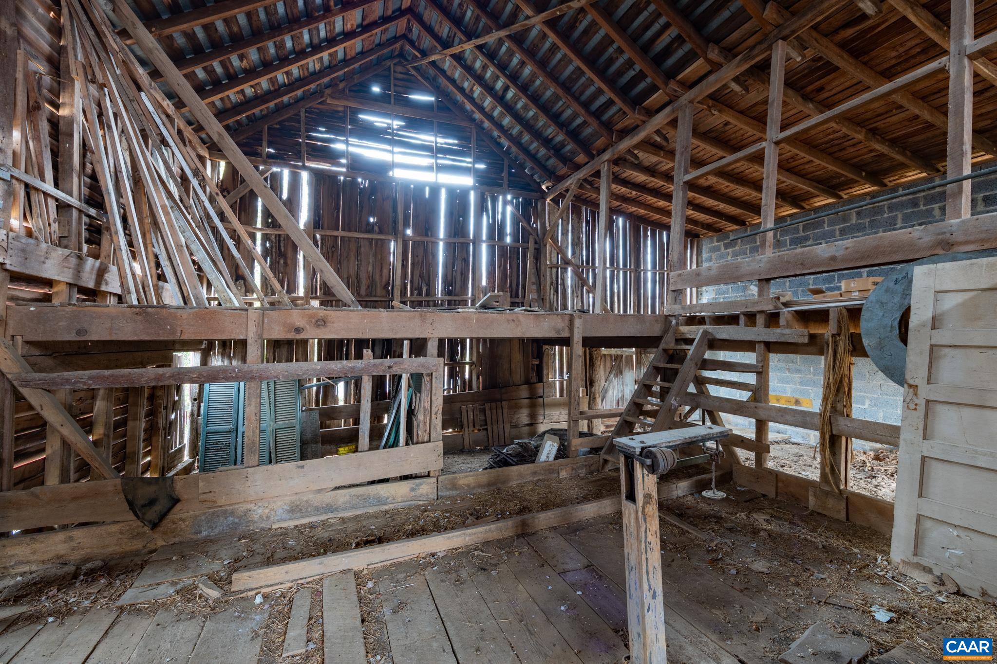 9451 Black Walnut Run Road Rhoadesville, VA 22542 - Photo 65 of 72 a view of a porch with seating space