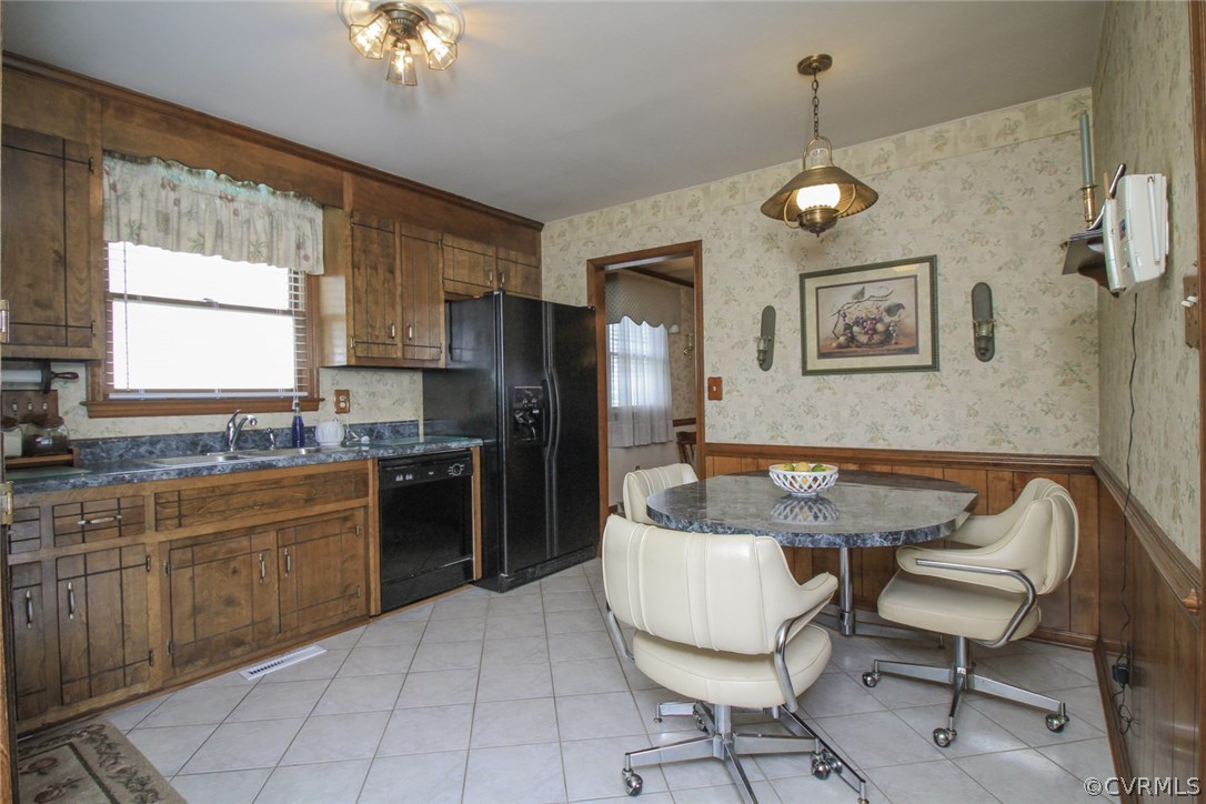 1500 Austin Road Chester, VA 23836 - Photo 17 of 30 a kitchen with a refrigerator and a sink