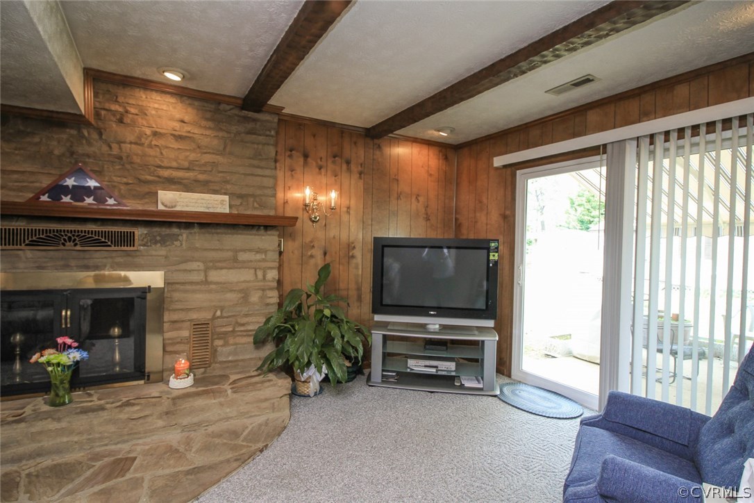 1500 Austin Road Chester, VA 23836 - Photo 23 of 30 a view of a livingroom with furniture and a fireplace
