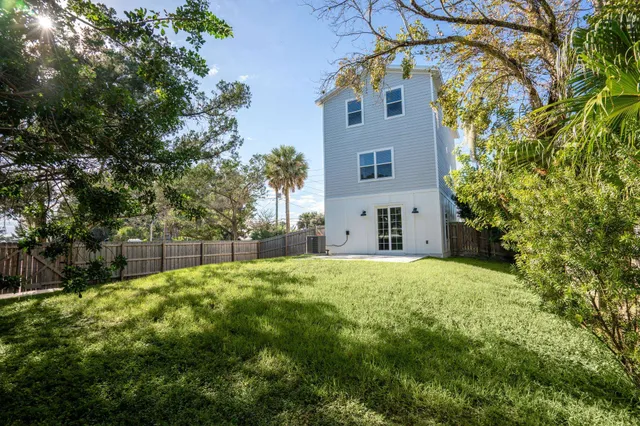 a view of backyard with green space