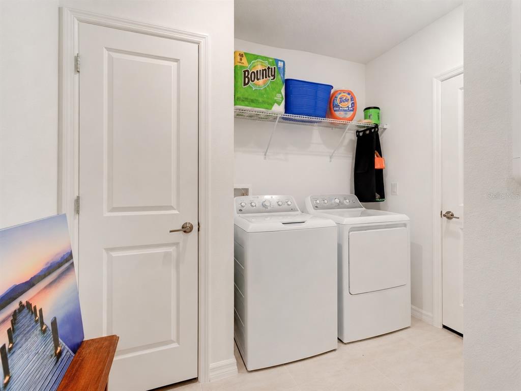 176 Jones Fish Camp Road Edgewater, FL 32141 - Photo 24 of 30 a utility room with dryer and washer