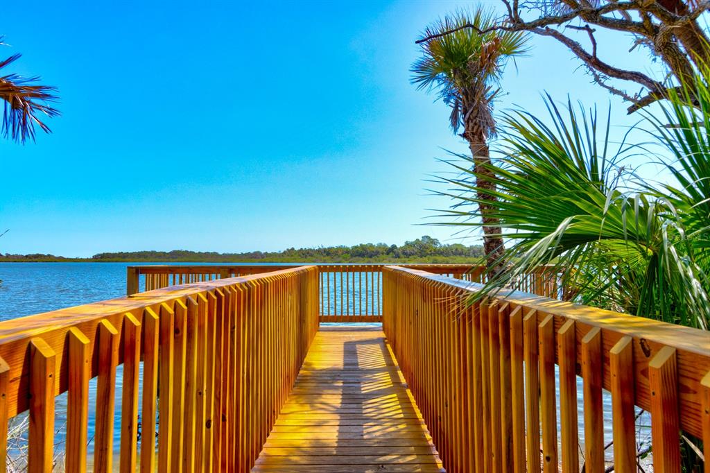 176 Jones Fish Camp Road Edgewater, FL 32141 - Photo 29 of 30 a view of balcony with wooden floor and fence