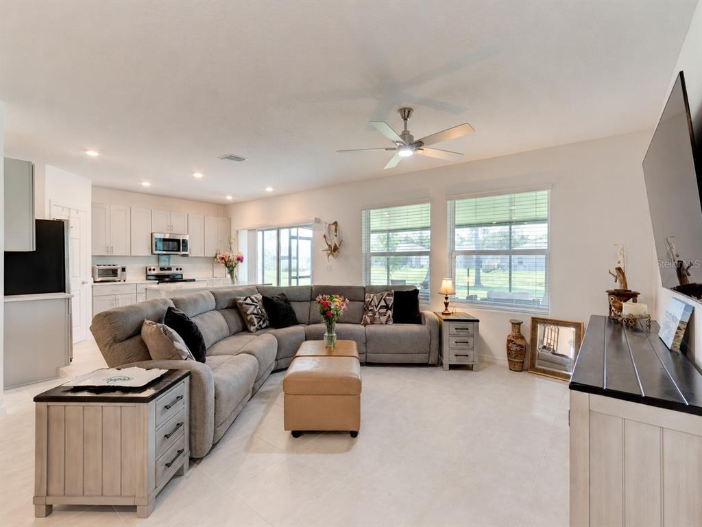 176 Jones Fish Camp Road Edgewater, FL 32141 - Photo 4 of 30 a living room with furniture and a large window