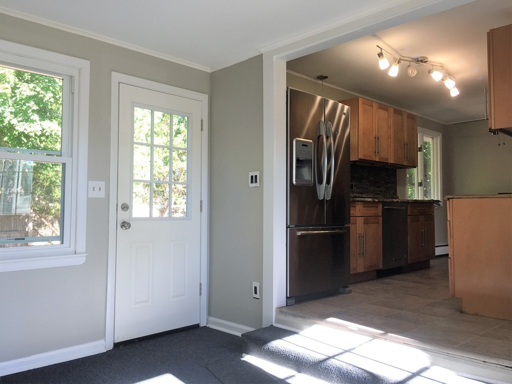 377 Stapleton Road Springfield, MA 01109 - Photo 7 of 17 a kitchen with a refrigerator and a sink