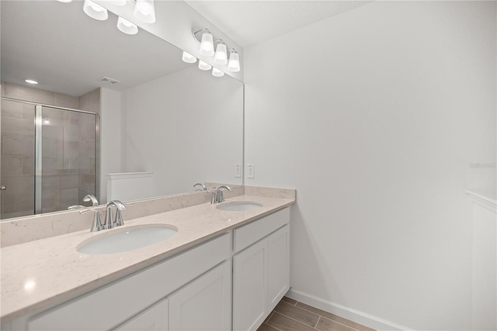 3339 Southeast 37th Ave Road Ocala, FL 34480 - Photo 14 of 21 a bathroom with a sink and a mirror