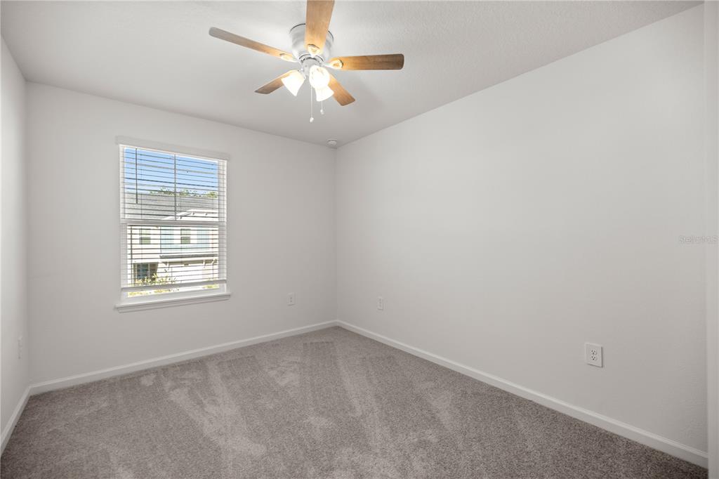 3339 Southeast 37th Ave Road Ocala, FL 34480 - Photo 20 of 21 an empty room with a window