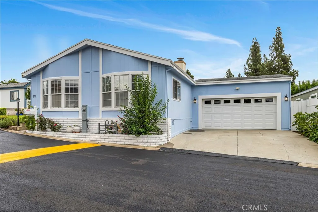 Crestmont Mobile Estates - Beautiful, updated, with rare two-car attached garage, 3 Bedroom, 2 Full Bath, 1,400 Sq Ft Living Space. Call this home!