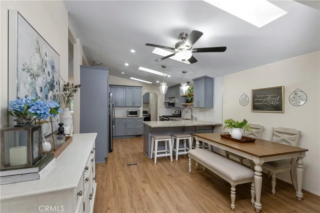 1051 Site, Unit 89 Brea, CA 92821 - Photo 15 of 36 a kitchen with a table and chairs in it