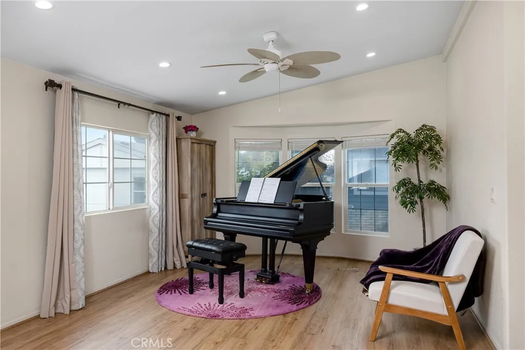 1051 Site, Unit 89 Brea, CA 92821 - Photo 22 of 36 a living room with furniture and a piano