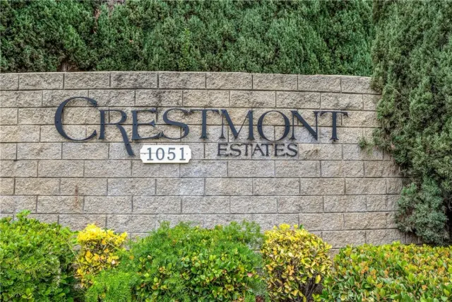 a view of a sign board with a wall