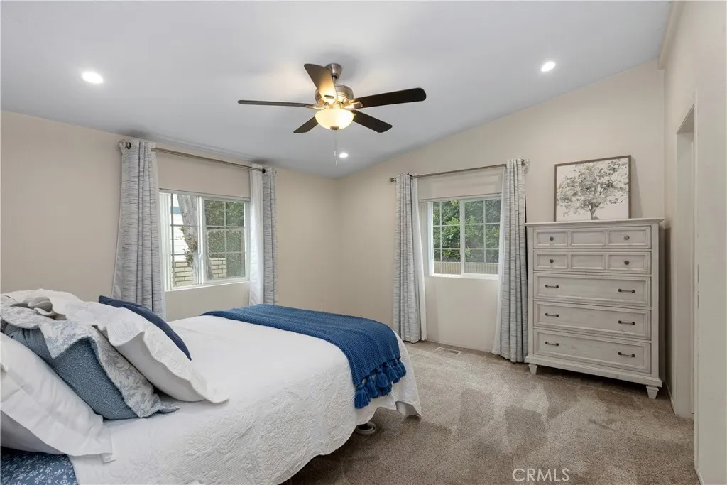 1051 Site, Unit 89 Brea, CA 92821 - Photo 9 of 36 a bedroom with a bed and a window
