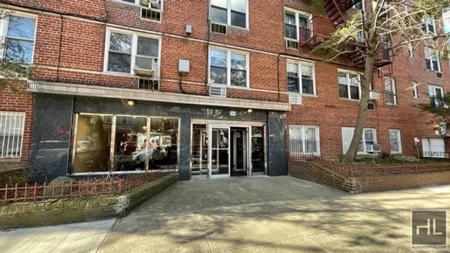 a front view of a building with street view