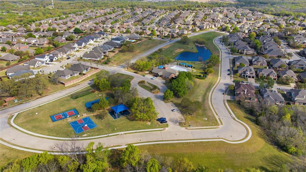 7705 Falcon Ridge Road Denton, TX 76208 - Photo 7 of 40 Aerial view of residential area with local amenities.
