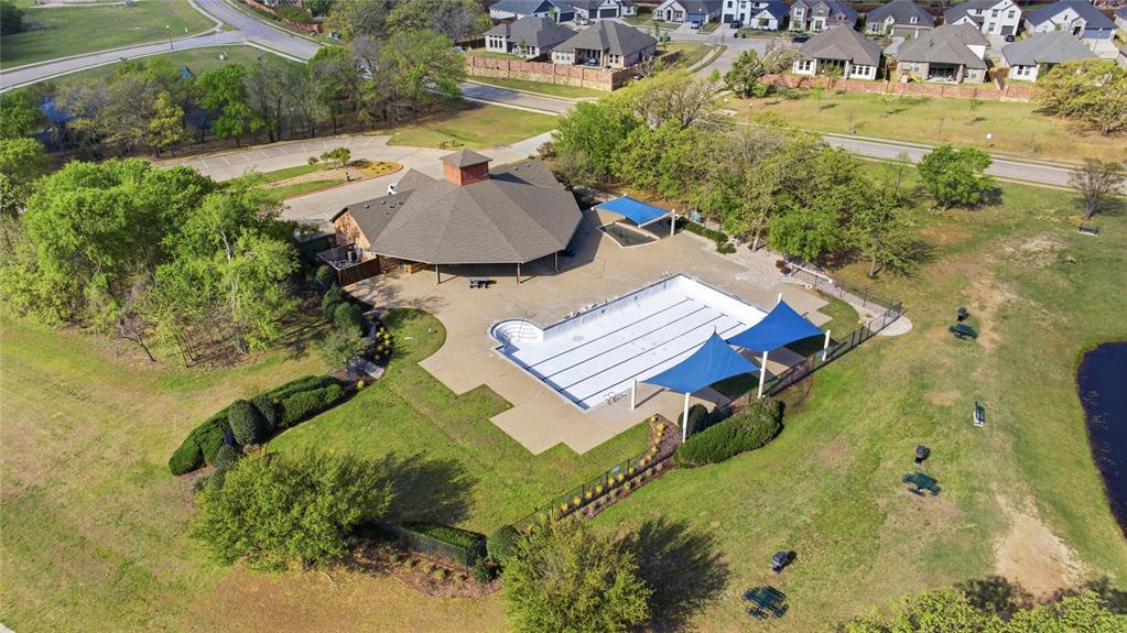 7705 Falcon Ridge Road Denton, TX 76208 - Photo 8 of 40 Aerial view of residential area with local amenities.