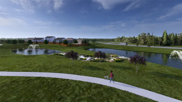 an aerial view of a house with garden space and street view