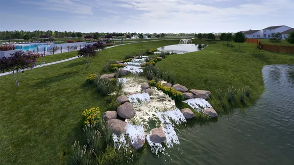 a view of a lake with a yard