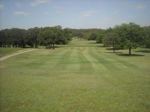 10 Ridglea Court Nocona, TX 76255 - Photo 20 of 39 a view of a field with trees in the background