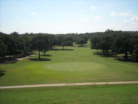 10 Ridglea Court Nocona, TX 76255 - Photo 23 of 39 a view of a golf course with a lake