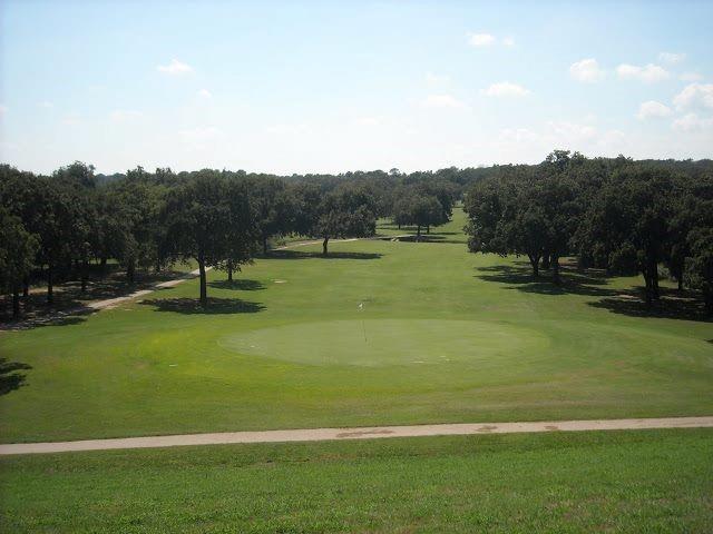 10 Ridglea Court Nocona, TX 76255 - Photo 29 of 39 a view of a golf course with a lake