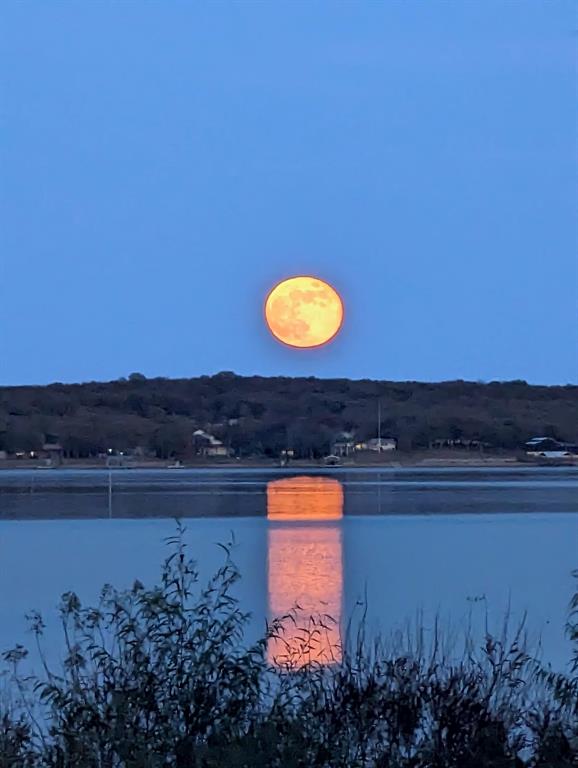 10 Ridglea Court Nocona, TX 76255 - Photo 36 of 39 a view of a lake with a backyard