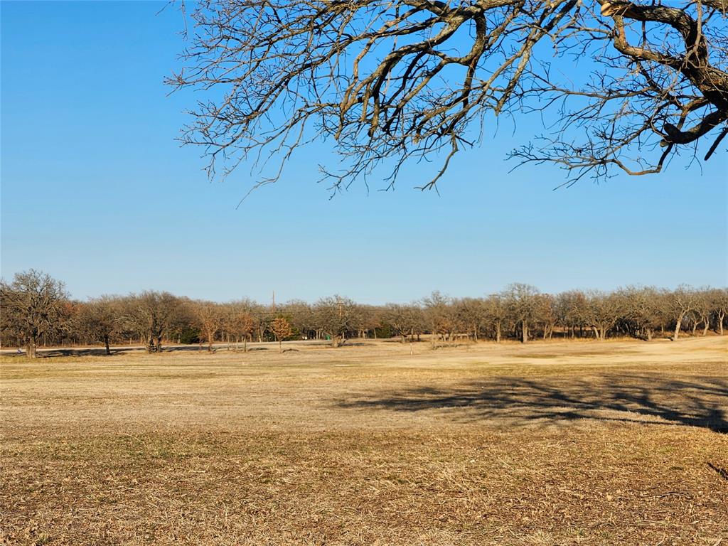 10 Ridglea Court Nocona, TX 76255 - Photo 10 of 39 a view of a lake with houses in background