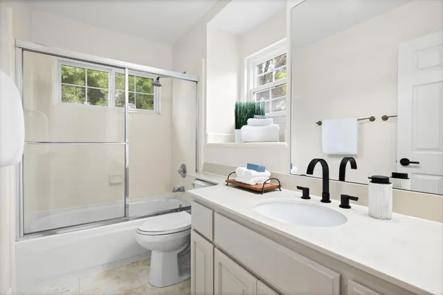 a view of sitting area with furniture on wooden deck