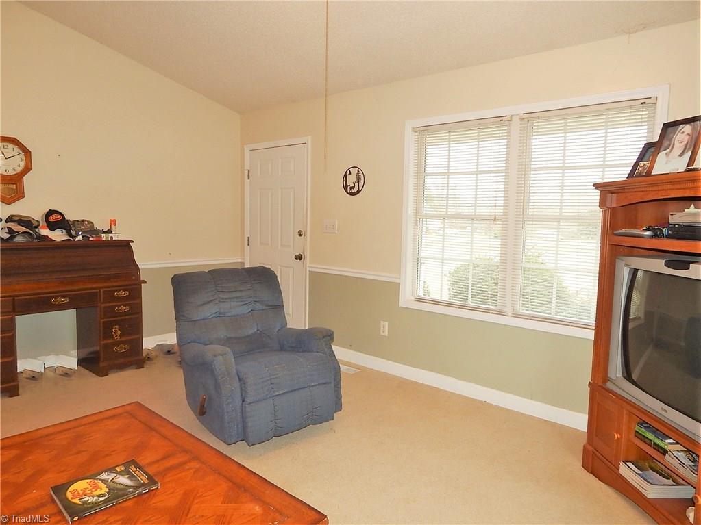196 Lawrence Road Stokesdale, NC 27357 - Photo 2 of 24 Living room and front entrance