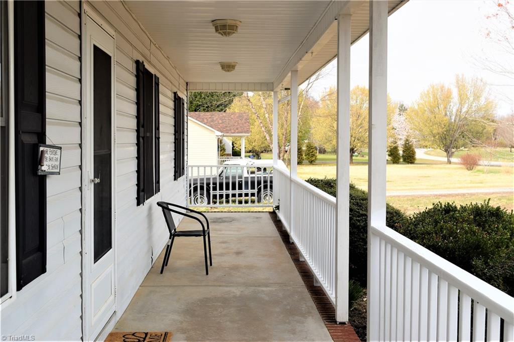 196 Lawrence Road Stokesdale, NC 27357 - Photo 19 of 24 Another view of covered front porch