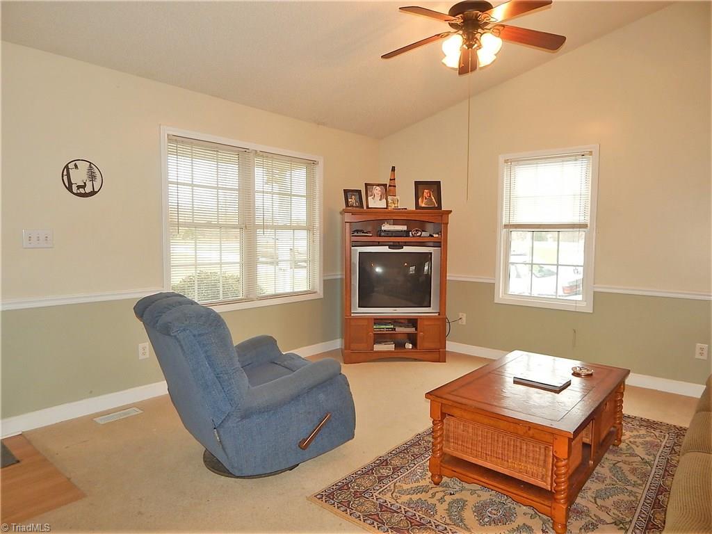196 Lawrence Road Stokesdale, NC 27357 - Photo 3 of 24 Another view of living room