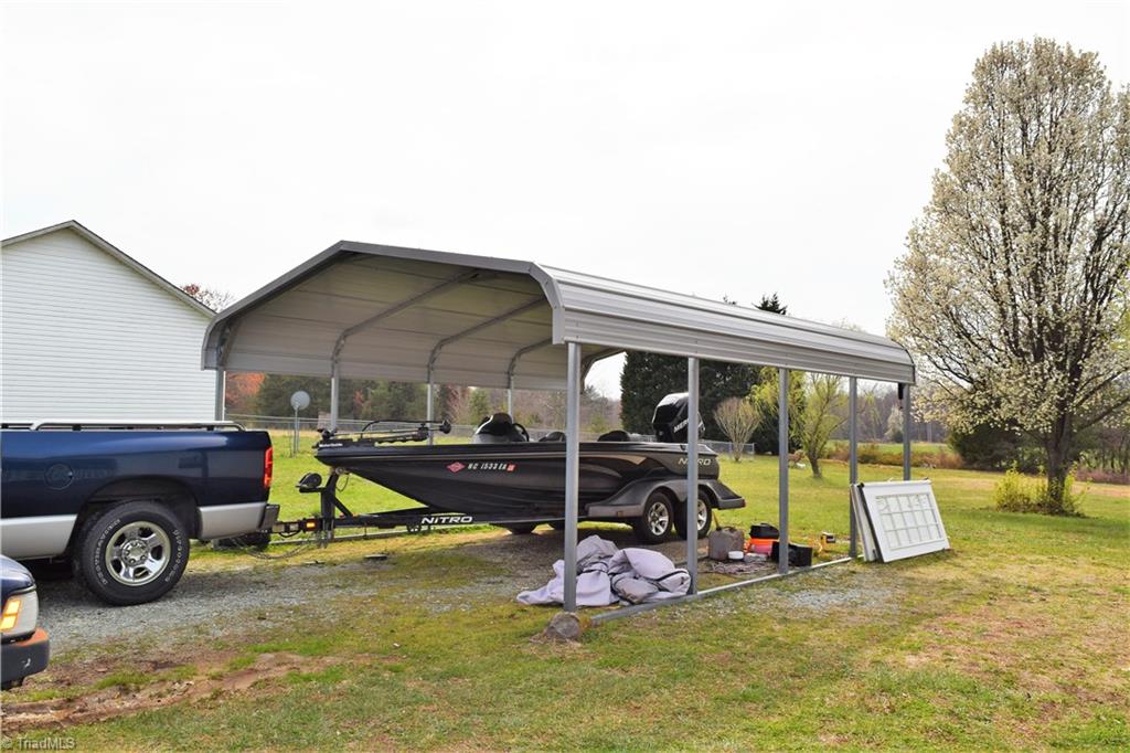 196 Lawrence Road Stokesdale, NC 27357 - Photo 21 of 24 Metal carport