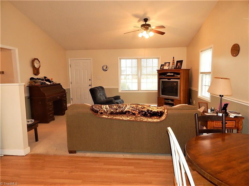 196 Lawrence Road Stokesdale, NC 27357 - Photo 7 of 24 View of living room from kitchen